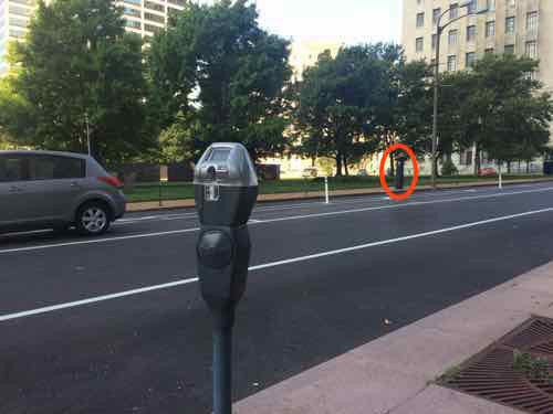 1000 block of Chestnut: On the North side single space meters, other side multi-space pay stations (one circled in red)