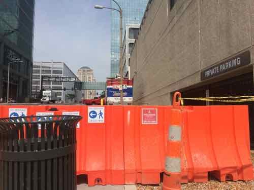 Pedestrians crossing back downtown are directed to not walk straight ahead, to go to the South side of Walnut (left)  or go one block North to Market (right)