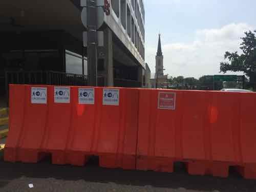 Looking East from 4th the same barricades indicate pedestrians shouldn't walk in a straight line