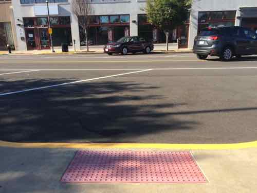 Unfortunately the mid-block crosswalks next to disabled parking wasn't restriped. 