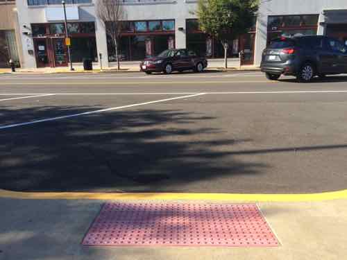 Unfortunately the mid-block crosswalks next to disabled parking wasn't restriped.