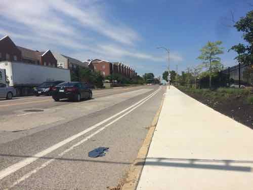 These lanes aren't about bikes, they're a way to narrow the outside drive lane from excess pavement.