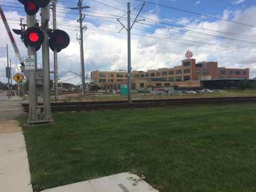 We can now see the light rail line, known as MetroLink, divides the space. Will discuss the renovated building in the background later in this post. 