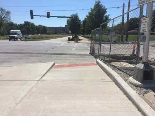 After: Now the ramp is wide and directional. The crosswalk won't be up against Southbound traffic anymore. 