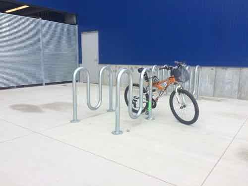 On the 11th I was horrified to see four of these awful bike racks placed too close together. Upon inquiry I was told they were temporary, the permanent racks to be installed soon.