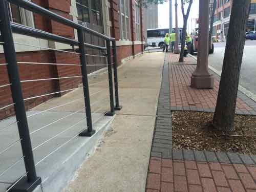 Last month I took this pic to show how almost no sidewalk was left after an ADA/wheelchair ramp was built to access the 