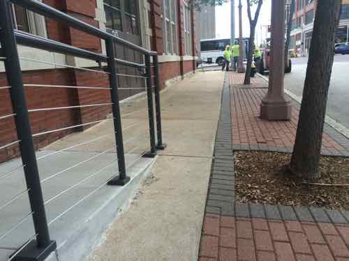 Last month I took this pic to show how almost no sidewalk was left after an ADA/wheelchair ramp was built to access the