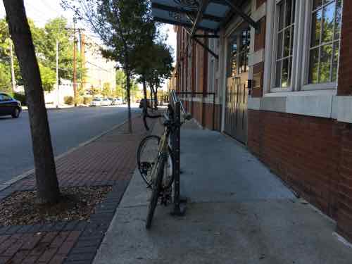 More recently I was going the opposite direction but a bike was occupying the little bit of sidewalk hat remained. 