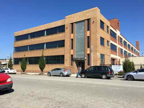 Beautiful proportions, great mix of brick colors, industrial windows, glass block