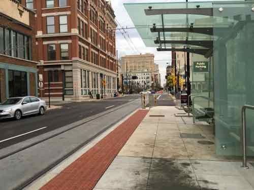 The platforms, built within the parking lane, are higher than the sidewalk to allow for level boarding. 