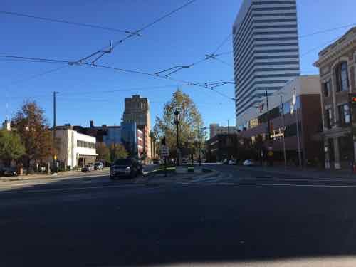 The overhead wires are visible in this view, looking East along Central Parkway from Race St