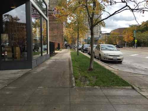 In some spots the new sidewalks were too narrow, we passed through here often meeting people trying to walk side-by-side. When meeting others only wide enough for single-file. 