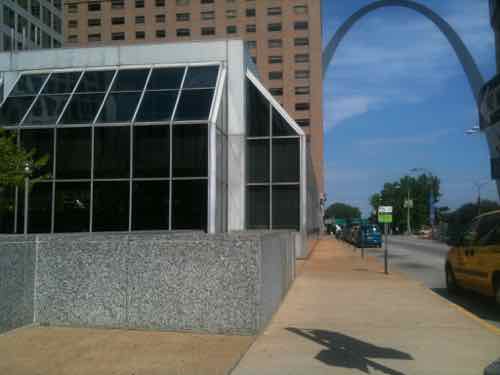 Looking East see can see the Arch. The building has zero relationship with the sidewalk, June 2010