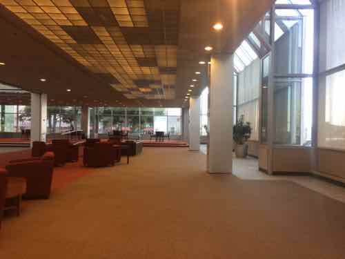 Inside looking East along the South atrium/greenhouse wall we can see the inward point we saw outside and the structure set back from the glass, July 2015