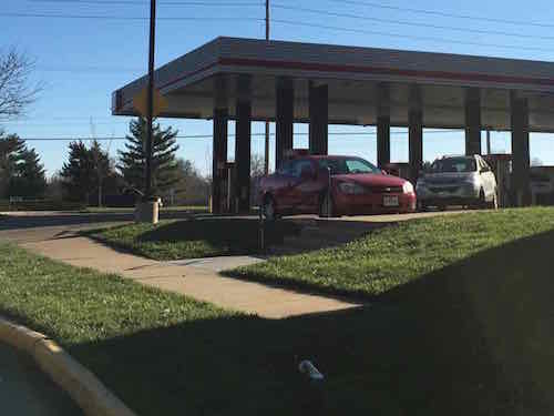 How does a pedestrian get to the QT from the sidewalk? Up these steps from the side street! 