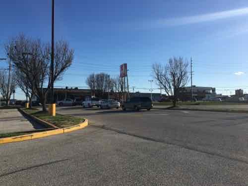 At the Kmart parking lot you see the only way in is the auto driveway