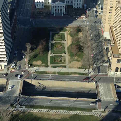 From the Arch we see Memorial Drive on either side of the depressed interstate lanes and Luther Ely Smith Square, December 2012