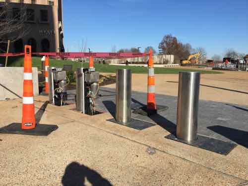 Continuing East on the outer sidewalk we see the motorized bollards that can be lowered as needed. These will likely be a maintenance issue. 