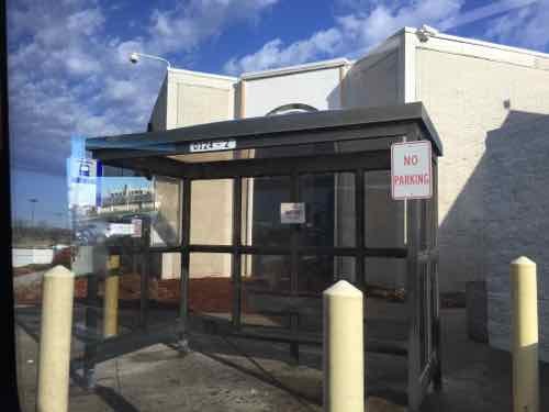 St, Clair Square. No smoking at bus shelter. No access to out parels