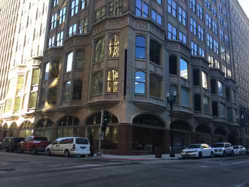 At 8th & Olive the big bays of the Arcade dominate. Webster University will have a public museum in the ground floor on this corner. 