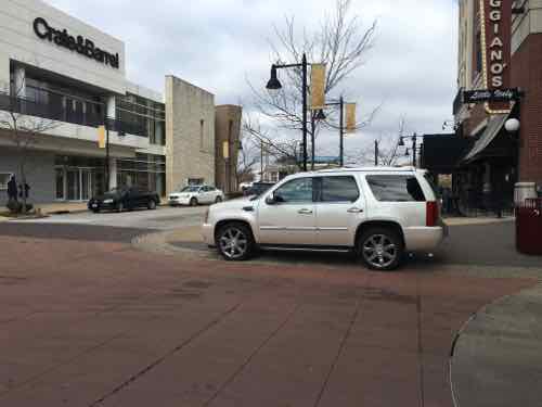 The owner was sitting in his SUV blocking the crosswalk when we arrived and when we left