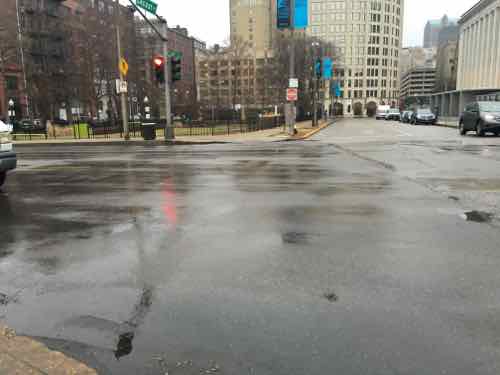 The North side of Locust at 14th, a signalized intersection, has no crosswalk marking 