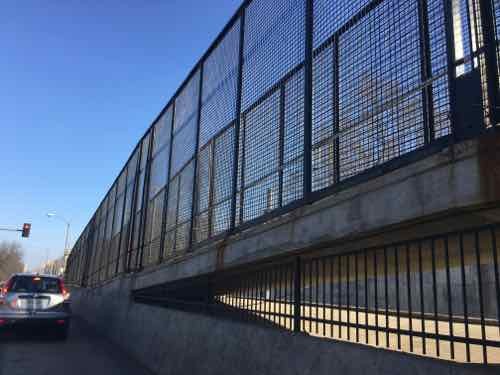 Cyclists & pedestrians must use ramps to cross over the tracks. 