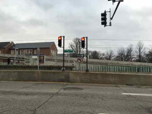 Southbound traffic on S. Meramec in Clayton see a wall and right turn only signs at Forest Park Parkway