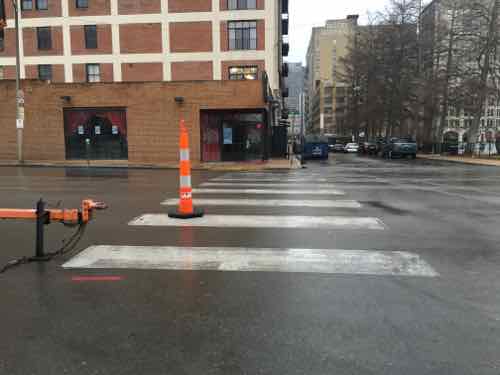 At St. Charles Street (glorified alley) there's no signal, no stop sign. There are two continental crosswalks 