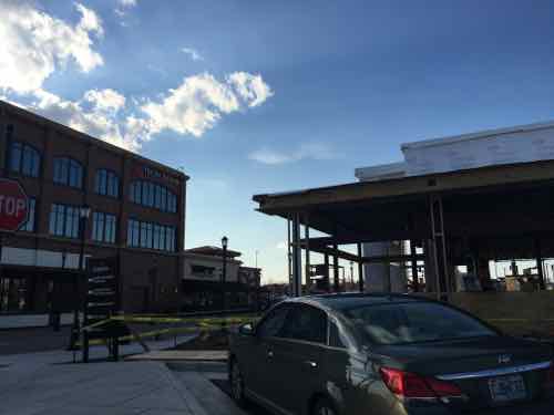 A new 1-story PF Change is under construction to the North of the original building