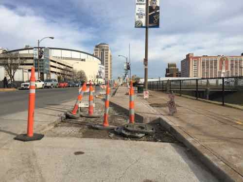 About halfway between 16th -18th the extra sidewalk narrows to the original width, January 2016