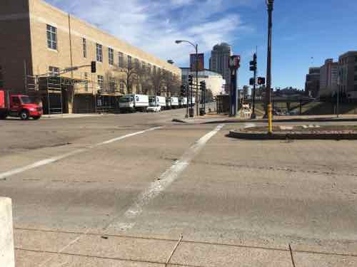 The pedestrian signal is visible only when way South pf the ramp & crosswalk 