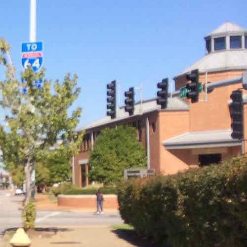 This is the best photo of the building I could find in my library. This shows the original corner, click image to view on Google's Street View