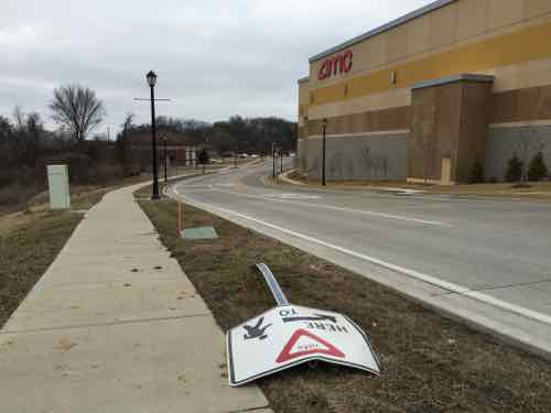 The pedestrian crossing sign had been run over 