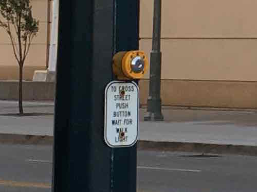 They al;so mark the buttons too let pedestrians know they need to activate the walk signal. 