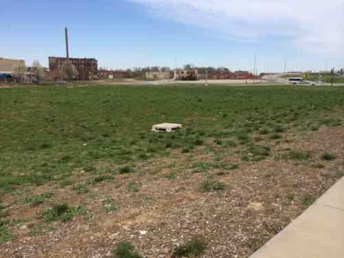 This land os all North of the proposed grocery store and Cass Ave. How will this be filled in? What route will people who live/work here take to walk to the grocery store? July 2012 image