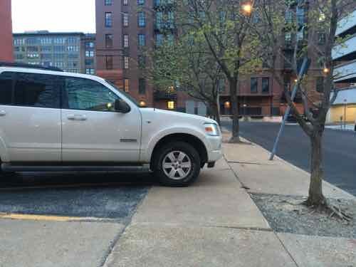 Cars were able to park on the public sidewalk because nothing physically prevented it, from April 4, 2016