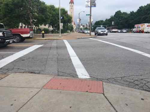 Looking West across 16th St at Market, note the location of the crosswalk relative to the detectable warning mat, click image for map to intersection