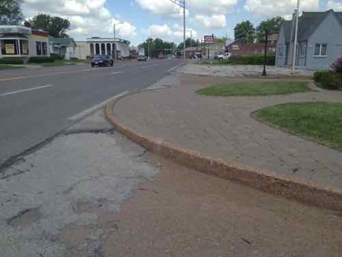 But I couldn't get past the median -- I had to roll in the Natural Bridge Roadway around this curb! 