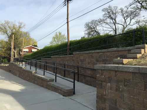 Two ramps now provide access to the houses up the hill. This helps those of us in wheelchairs, but also parents pushing strollers or seniors returning home with groceries