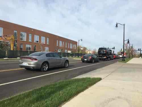 After walking 2/10ths of a mile to reach Natural Bridge, pedestrians going to/from this school are expected to walk another 2/10th of a mile out of their way to cross at this light