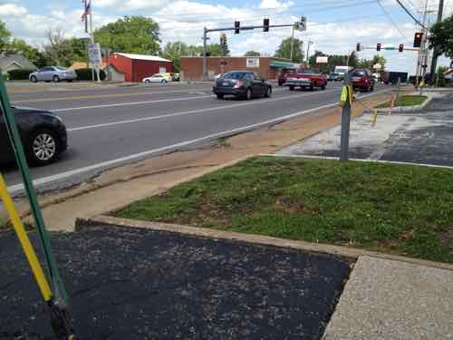 But this presented issues getting out to the upcoming sidewalk and ramp at Hanley to cross Natural Bridge