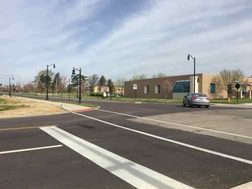 Leave MetroLink for the school across Natural Bridge, the nearest crossing is out of view to the left 