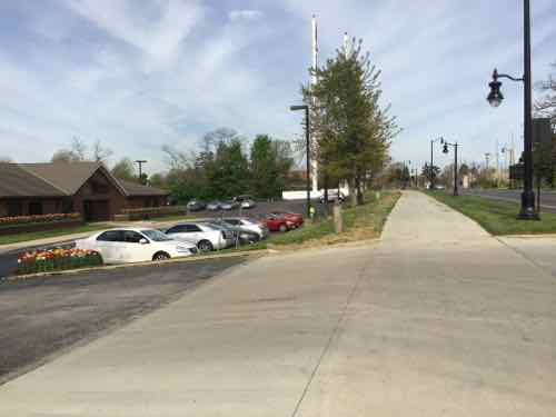 Now looking West from the other driveway, toward UMSL and MetroLink