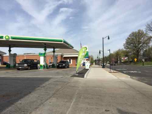 At this gas station there is clear physical separation between the public sidewalk and drive for the gas pumps. This is important for maintaining pedestrian space