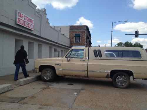 In 2012 the buildings along the South side were fronted by parking, no clear pedestrian sidewalk