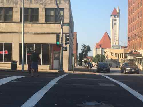 Looking South across Olive from the NE corner, the automatic walk light