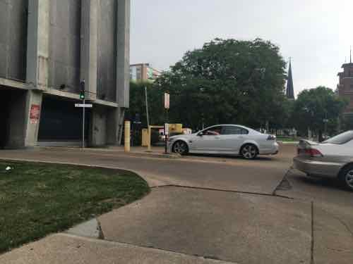 When a car exists another is allowed to enter. Supervisors don;t wait in line, they come up from 16th and enter upon arrival.