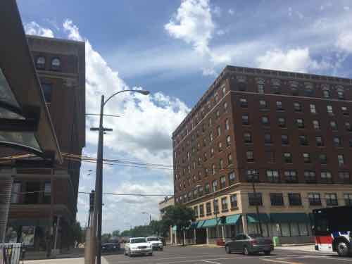 625 N Euclid, on the left, with 6 floors, is about the same massing as the 8-story building to the North. 