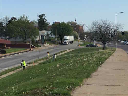 Waiting for the #90 MetroBus on Hampton Ave. I watched as at least three Forestry Dept workers were edging, April 15, 2016